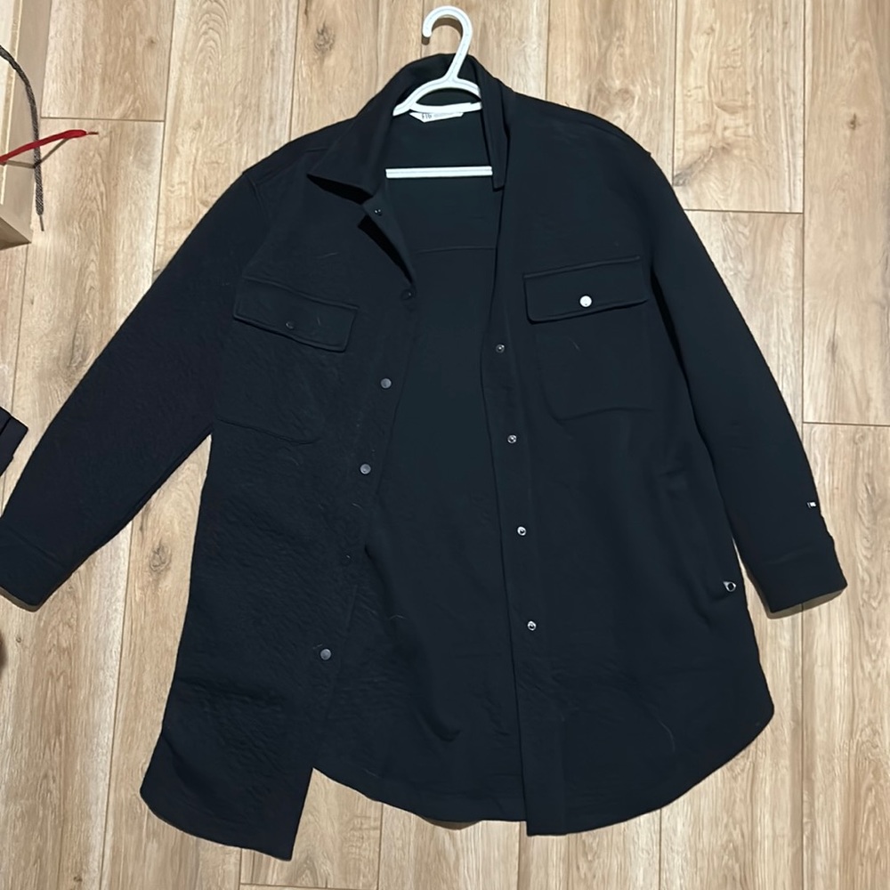 Brand new Fig, Black button up women’s jacket. Brand new never been worn.